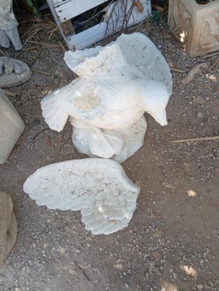 Figura de piedra águila para pegar alas