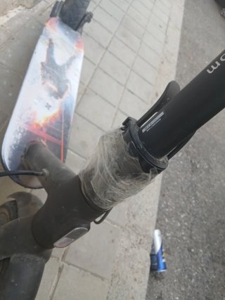 Patinete eléctrico con bolsa