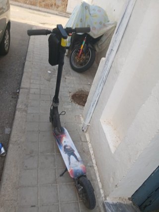 Patinete eléctrico con bolsa