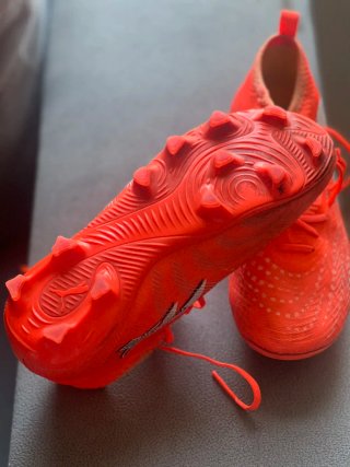 Botas de fútbol niño naranja