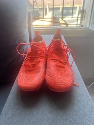 Botas de fútbol niño naranja