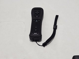 1 mando wii con Motion negro original con funda