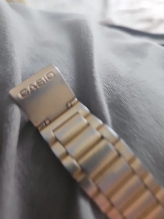 Reloj Casio Dorado y Plateado