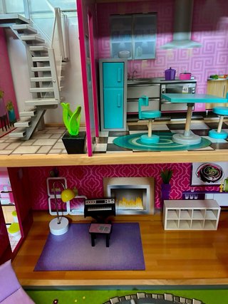 Casa de muñecas KidKraft con piscina
