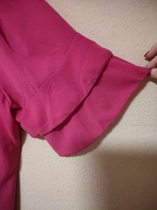 Blusa rosa con volantes