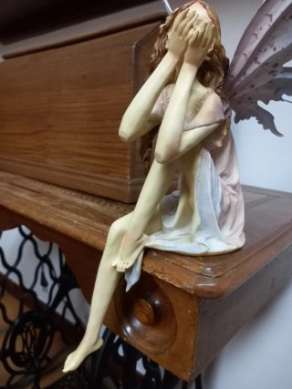 Statua fata con ali
