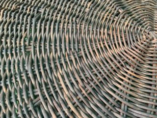 Sofá curvo y mesa ratona exterior rattan natural