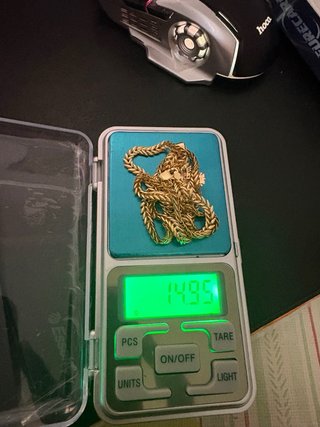 Cadena de oro con colgante de cruz