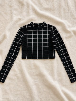 Top manga larga con estampado de cuadros