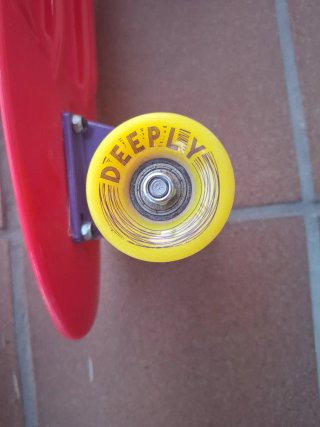 Monopatín Penny Deeply Rojo-Morado-Amarillo