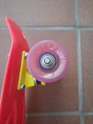 Monopatín Penny Deeply Rojo-Morado-Amarillo