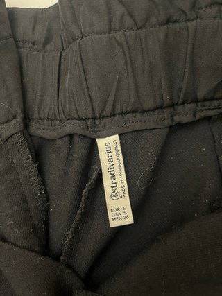 Pantalones negros con cinturón
