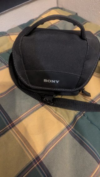 Sony a6000 + 16-50mm OSS + Caja + Mochila Sony