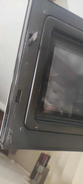 Microondas con puerta rota