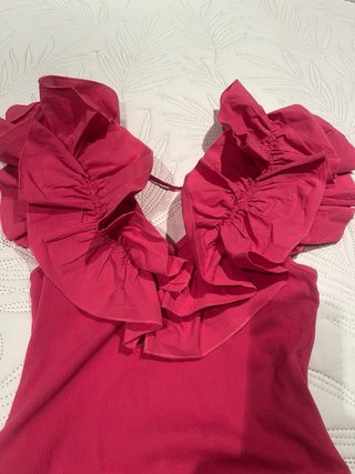 Body rosa con volantes