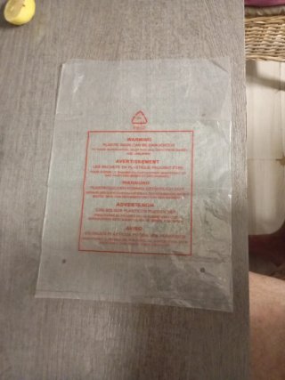 Bolsa de plástico con advertencias consola sega