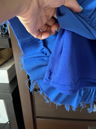 Falda corta azul con volantes