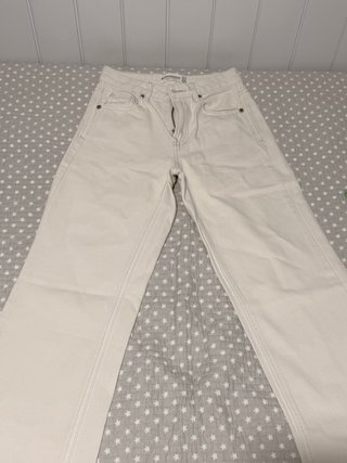 Vaqueros largos beige cremallera defectuosa