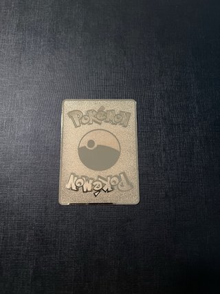 Carta Pokémon Charizard V Metal y Pikachu vuelo V