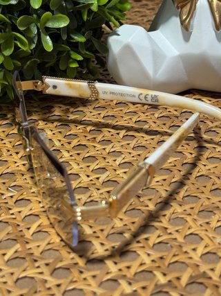 Gafas sin montura doradas lujo