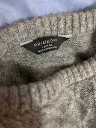 Jersey gris tejido trenzado
