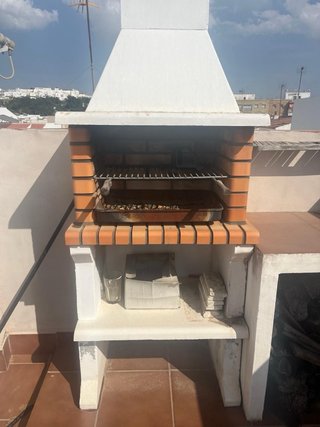 Barbacoa de obra ladrillo y cemento