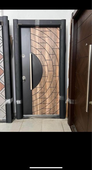 Puerta blindada exterior diseño mármol