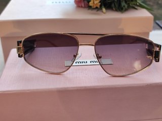 Gafas de sol Miu Miu doradas vintage