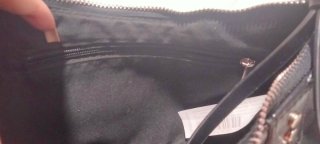 Bolso negro con tachuelas