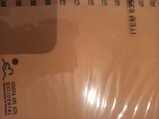 Lapicero y cuaderno forma basura