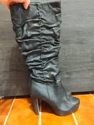Botas altas negras de tacón