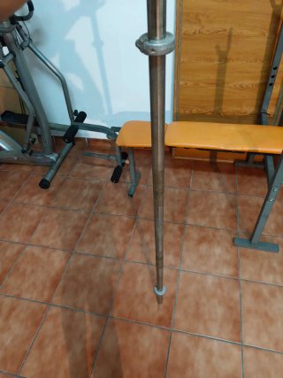 Pesas, discos y barras de gimnasio