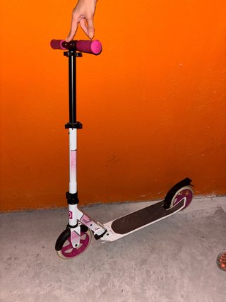 Patinete Oxelo plegable rosa y blanco