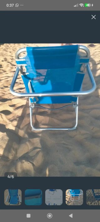 Silla reclinable azul y plateada