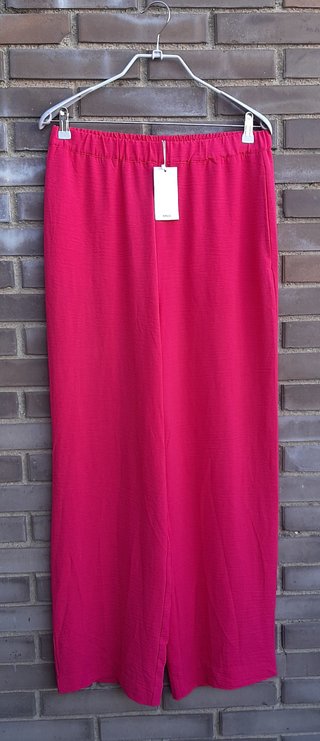 Conjunto camisa y pantalón rosa