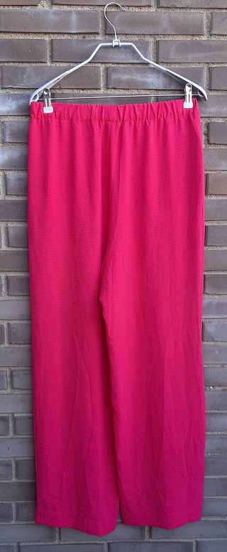 Conjunto camisa y pantalón rosa