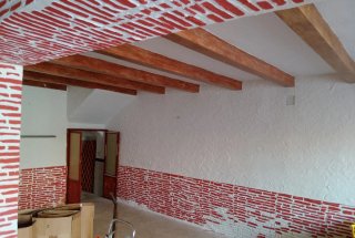 Local comercial y vivienda.