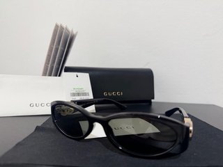 Gafas de Sol Gucci Mujer Negro y Dorado