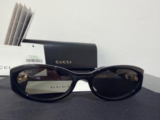 Gafas de Sol Gucci Mujer Negro y Dorado