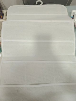 Organizador beige y blanco con ovejas