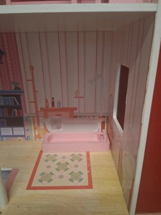 Casa de muñecas de madera