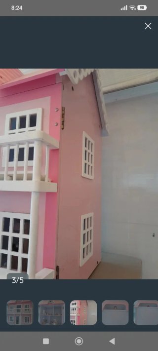 Casita de muñecas rosa