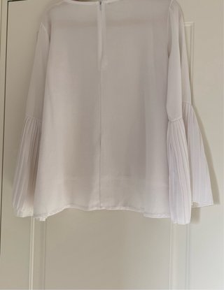 Camicia bianca manica lunga con pieghe
