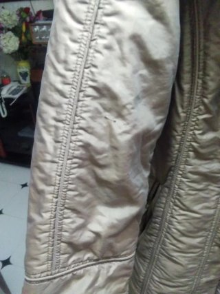 Abrigo de invierno mujer dorado
