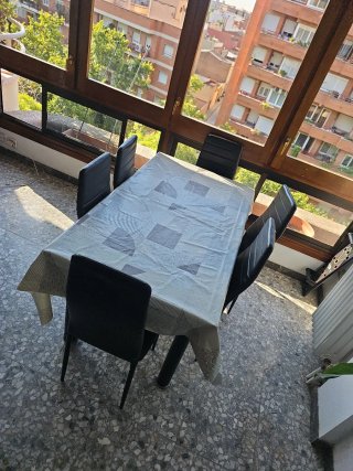 Mesa cristal negro y 6 sillas comedor