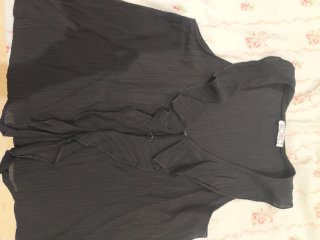 Musculosa mujer volantes negra