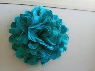 Flor para pelo azul/verde azulado