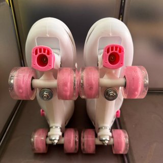 Pattini a rotelle bianchi/rosa TG 9.5-10.5
