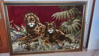Tapiz de leones en terciopelo.