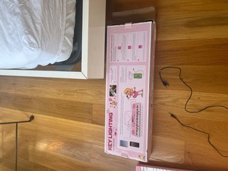 Piano infantil rosa con micrófono